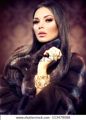 Beauty Fashion Model Girl in Mink Fur Coat. Beautiful Woman in Luxury Brown Fur Jacket