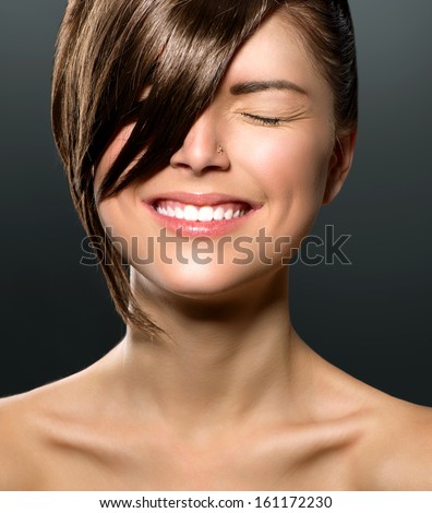 Beauty Teenage Girl Portrait. Fashion Haircut. Hairstyle. Stylish Fringe. Short Hair Style. Beauty Teenager. Laughing Surprised Woman With Closed Eyes