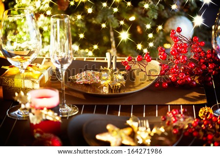 Christmas And New Year Holiday Table Setting. Celebration. Place setting for Christmas Dinner. Holiday Decorations. Decor.