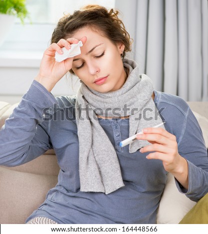 Sick Woman with Thermometer. Headache. Flu. Woman Caught Cold. Virus