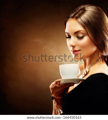 Coffee. Beautiful Girl Drinking Tea Or Coffee. Beauty Woman Enjoying Coffee. Cup Of Hot Beverage.