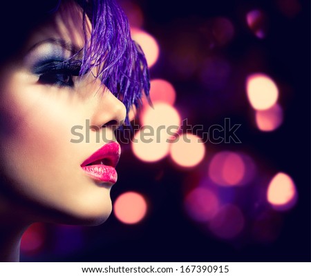 Fashion Model Girl. Holiday Woman Over Glowing Bokeh Background. Fashion Art Girl Portrait With Violet Hair. Creative Hairstyle And Makeup. Make-Up. Darkness. Night Party