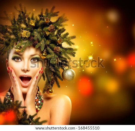 Christmas Woman. Beautiful New Year And Christmas Tree Holiday Hairstyle And Make Up. Beauty Girl Portrait. Colorful Makeup, Hair, Nail Polish And Accessories. Surprised Woman. Open Mouth, Emotions