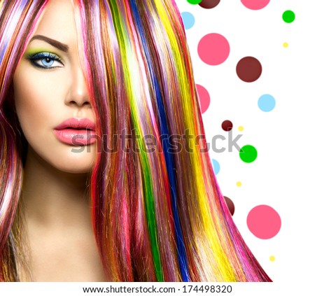 Colorful Hair and Makeup. Beauty Fashion Model Girl with Colorful Dyed Hair. Colourful Long Hair and Make up for Blue eyes. Portrait of a Beautiful Girl with Dyed Hair, professional hair Coloring