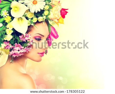 Beauty Spring Girl With Flowers Hair Style. Beautiful Model Woman With Blooming Flowers On Her Head. Nature Hairstyle. Summer. Holiday Creative Makeover. Fashion Makeup. Make Up. Vogue Style Portrait