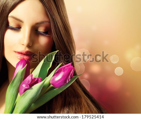 Beauty Woman with Spring Flower bouquet Beautiful girl with a Bouquet of Tulip flowers Isolated on a white background Happy surprised model woman smelling flowers Mothers Day Easter holiday Beauty Woman with Spring Flower bouquet Beautiful girl with a Bouquet of Tulip flowers Isolated on a white background Happy surprised model woman smelling flowers Mothers Day Easter holiday