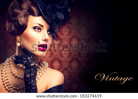 Retro Woman Portrait. Vintage Style Girl Wearing Old fashioned Hat and Gloves, retro Hairstyle and Make-up. Romantic lady