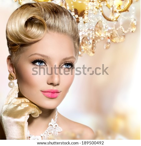 Retro Woman Portrait. Glamour Lady. Beauty Vintage styled Girl with perfect make up and hairstyle. Luxury interior