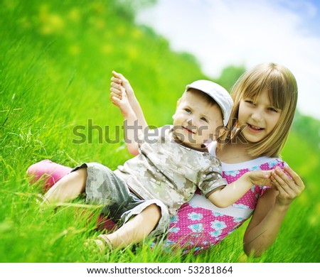 Happy children-sister and brother outdoor