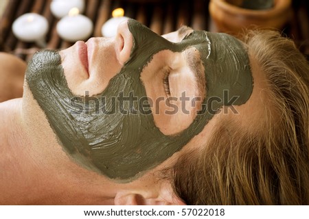 Spa.Handsome Man with a Mud Mask on his Face