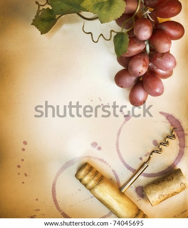 Wine Cork, Corkscrew and red wine stains on the vintage paper background
