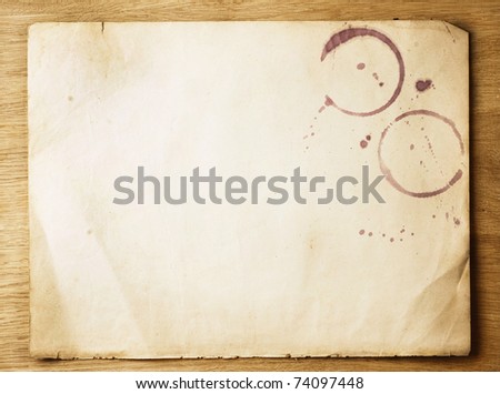 Old Paper sheet over wooden background