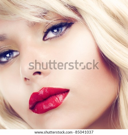 Beautiful Blond Woman Portrait close-up.Hairstyle.Makeup.Retro Style