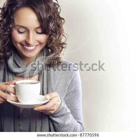 http://image.shutterstock.com/display_pic_with_logo/195826/195826,1320053998,2/stock-photo-beautiful-woman-with-cup-of-tea-or-coffee-87770596.jpg