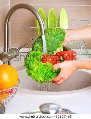 Fresh Vegetables Washing.Healthy Food.Kitchen
