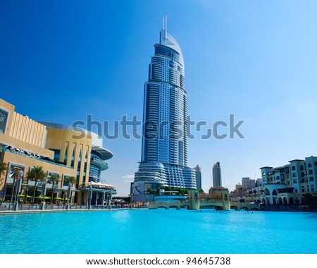 DUBAI, UAE - NOVEMBER 29: Address Hotel and Lake Burj Dubai on Nov 29, 2011 in Dubai. Located in Downtown Dubai, overlooking the world’s tallest tower, Burj Khalifa and attached to The Dubai Mall