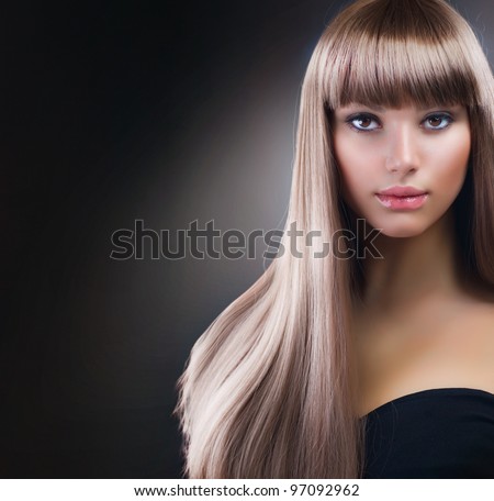 Fashion Blond Girl. Beautiful Makeup and Healthy Hair over Black Background