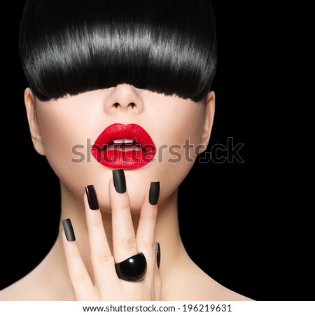 High Fashion Model Girl Portrait with Trendy Hair style, Make up and Manicure. Long Black Fringe Hairstyle, Black Matte Nail Polish and Red Matte Lipstick. Woman Makeup. Sexy Lips. Haircut.