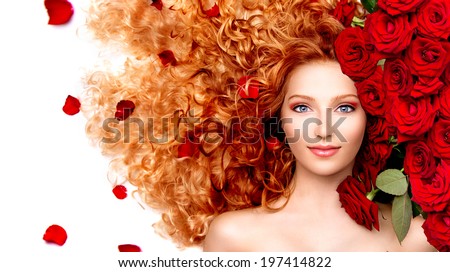 Beauty model girl with long curly red hair and beautiful red roses hairstyle. Fashion woman with Wavy healthy hair isolated on white background. Permed hair