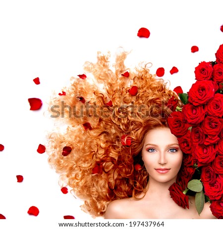 Beauty model woman with long curly red hair and beautiful red roses hairstyle with flowers and petals. Fashion girl with wavy healthy hair isolated on white background.
