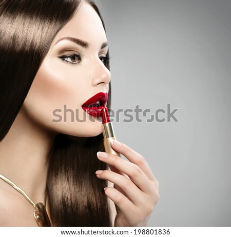 Lipstick. Professional Lips Make-up. Lipgloss. Beauty Girl Applying Lip stick