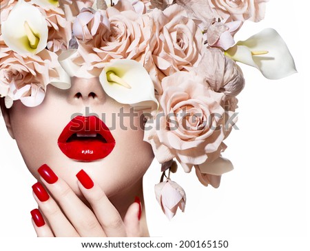 Fashion Sexy Woman with flowers. Vogue style Model girl face with roses. Red Sexy Lips and Nails closeup. Manicure and Makeup. Make up. Beauty lady face isolated on white background. Perfect skin