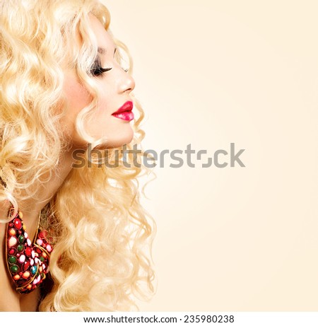 Glamour Blonde lady, Beauty model Girl With Healthy Long Curly Hair. Blond Woman Portrait. Wavy permed Hair, fashion make up and accessories