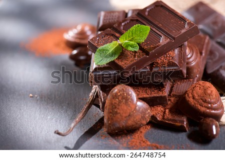 Chocolates. Chocolate. Assortment of fine chocolates in white, dark, and milk chocolate. Variety of Praline Chocolate sweets