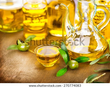 Olive Oil. Bottle of Virgin Olive Oil. Olives and Healthy Olive oil bottle. Diet. Dieting concept. Healthy eating
