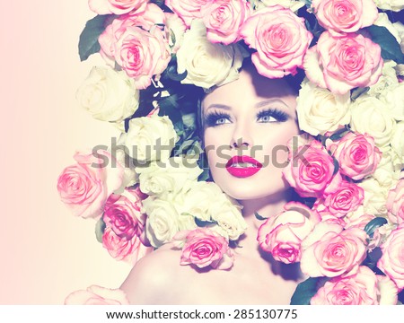 High fashion Vogue styled portrait of beauty sexy model girl with roses hairstyle. Art glamour Woman with bright holiday make-up. Makeup