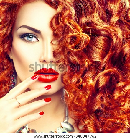 Beauty young woman with curly red hair, perfect make up and manicure. Permed hair. Glamour lady, Beauty Girl. Beautiful Woman Portrait. Blond Wavy Hair, perfect make up