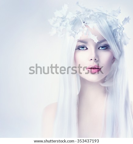 Winter Beauty Woman portrait with long white hair. Beautiful Fashion Model Girl with Snow Hair style and Make up. Holiday Makeup. Winter Queen. Christmas Woman
