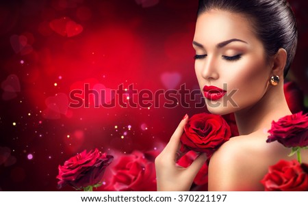Beauty romantic woman with Red Rose flowers. Valentine. Red Lips and Nails. Beautiful Luxury Makeup and Manicure. Valentines Day border design. Portrait of fashion model girl on blurred red background