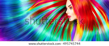 Beauty Fashion Model Girl with Colorful Dyed Hair. Colourful Long Hair. Portrait of a Beautiful Woman with Colorful Dyed Hair, professional hair Coloring. Colouring rainbow hair, bright long haircut