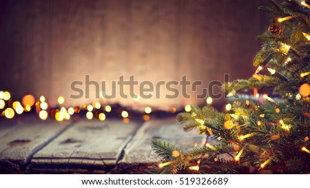 Christmas Holiday Background, Christmas table background with decorated Christmas tree and garlands. Beautiful Empty Christmas room. New Year Frame for your text