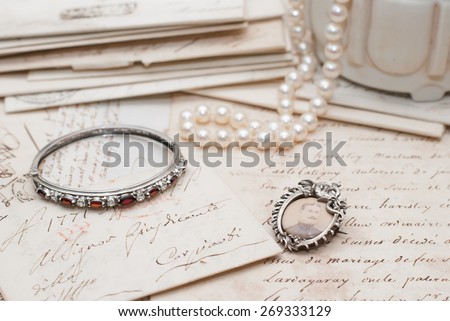 Old letters and jewelry