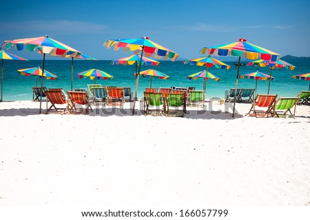 Camp Bed under the umbrella of colorful  on beach Phuket, Thailand