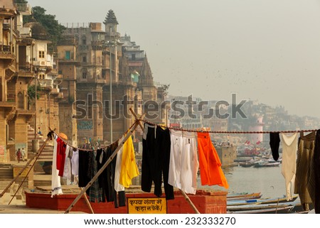 VARANASI,INDIA - October 29,2014 : Drying laundries on the ghats of Varanasi.Ganges river is also used as laundry service  in Varanasi.