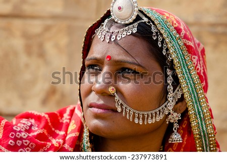 JAISALMER,INDIA - November 8,2014 : Unidentified Indian woman dressed her traditional scarfs with very nice ornaments and piercings in Jaisalmer,india.