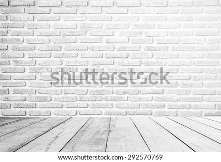 interior of old white brick wall with old white wooden floor.