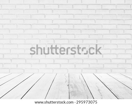 interior of old white brick wall with old white old wooden floor.