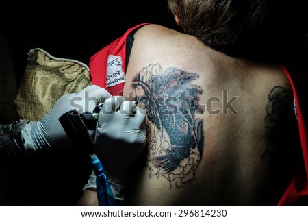 Showing process of making a tattoo. Tattoo design in pattern