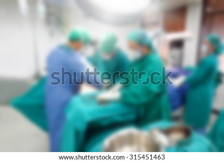 Medical team performing surgery on a girl cesarean in hospital : Medical team in operating room : The patient\'s doctor : Patient Support