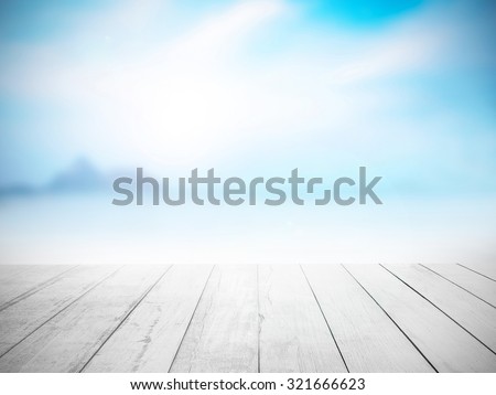 White old wood floor with blurred sea background : Blurred on vacation summer ocean beach : Wooden stage : Summer Vacation at sea : Green View.