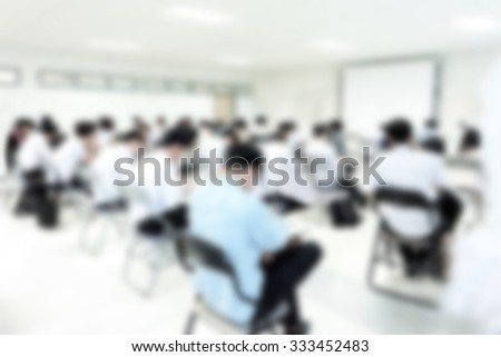 Abstract blur background of student during study or test and exams from teacher or professor in classroom in undergraduate at university.