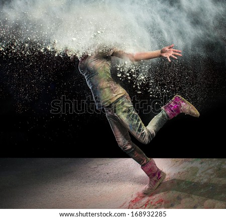 Redhead Girl With Colored Powder Exploding Around Her Head And Into The Background.