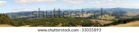 Panorama landscape of Oregon, taken on top of mount pisgah. Mostly random fields with trees and various houses scattered about.
