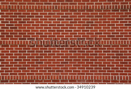 A new brick wall with 11 rows of horizontal bricks, and then 1 row of vertical. There\'s three vertical rows.