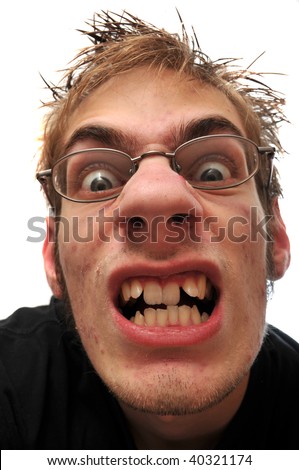 stock photo : Angry ugly man with crooked teeth and glasses isolated on 