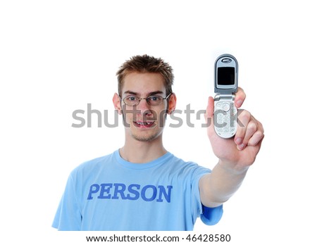 Young 18 year old adult teenager shows his new miniature 3G cell phone to the viewer isolated on white background.